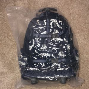 Mackenzie Navy Dino Bones Glow in the Dark Rolling Backpack
